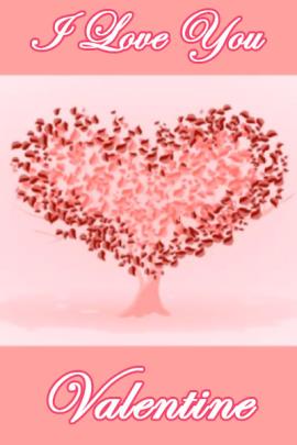 A heart-shaped tree made up of red and pink leaves.