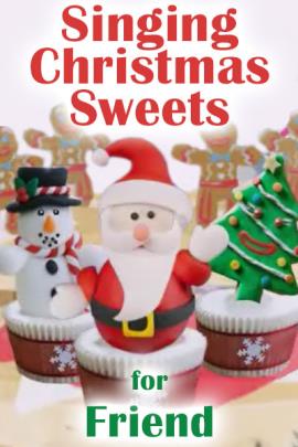  Three cupcakes with cookie decorations standing in the icing: Santa, a Christmas tree, and a snowman. There are gingerbread men in the background, and Singing Christmas Sweets for Friend is written over the cupcakes. 