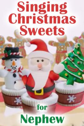 Three cupcakes with cookie decorations standing in the icing: Santa, a Christmas tree, and a snowman. There are gingerbread men in the background, and Singing Christmas Sweets for Nephew is written over the cupcakes. 
