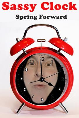 A red, old fashioned alarm clock against a white background. In the clocks face is a human face. The title above in red and black fonts reads, "Sassy Clock Spring Forward"