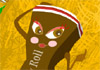 A chocolate candy roll, leaning against a haystack.