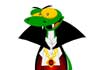 A gecko is dressed as a vampire for Halloween. He smiles at the viewer, showing off his fangs.