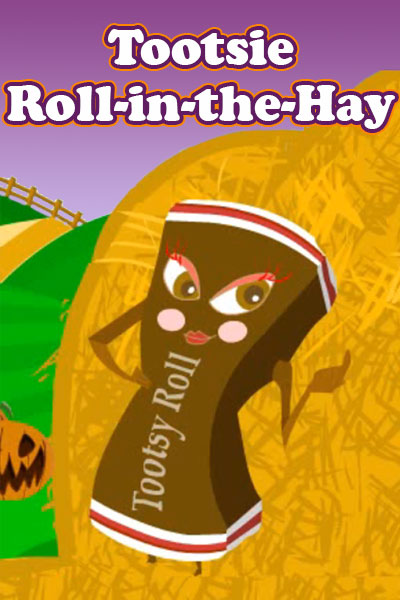 A chocolate candy roll, leaning against a haystack.