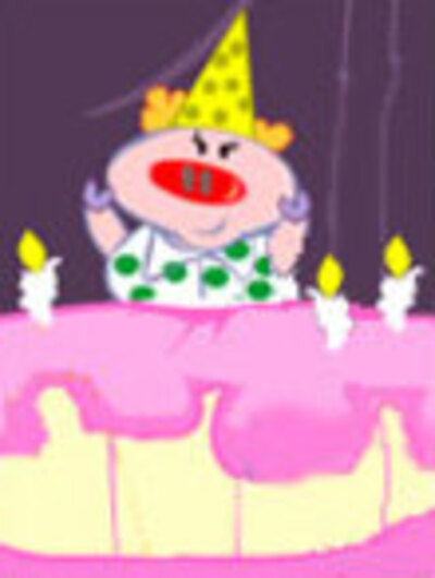 A pig wearing a polka dotted shirt, red nose, and clown wig jumps up from inside a birthday cake. 