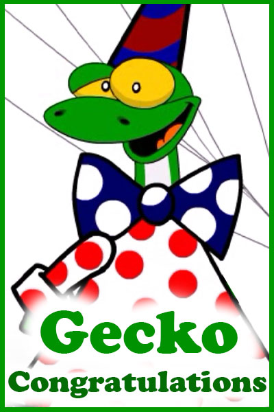 A gecko dressed in a polka-dotted shirt, and bow tie.