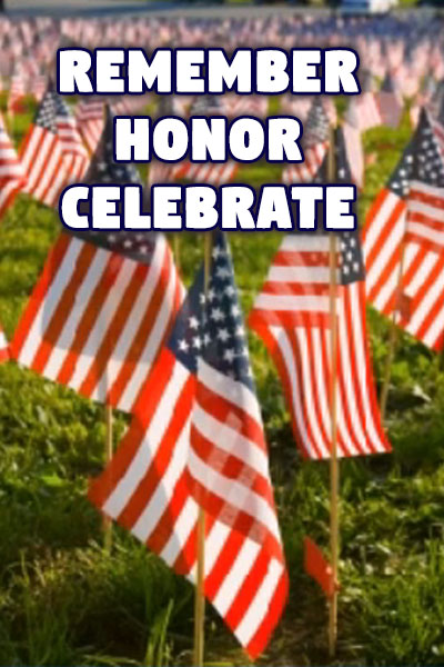 A closeup view of a field of hundreds of American flags that honor fallen soldiers.