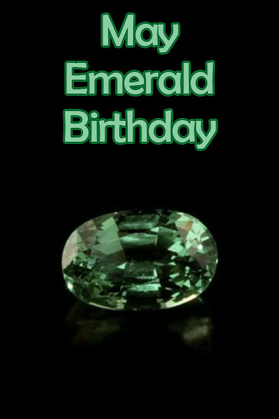 A closeup of a faceted emerald gemstone.