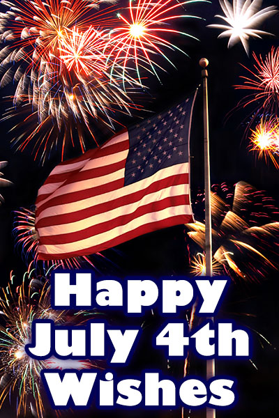 An American flag waves in front of a night sky. Fireworks fill the sky behind the flag.