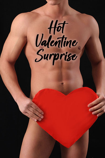 A muscular nude man holds a paper heart over his crotch to conceal the area.