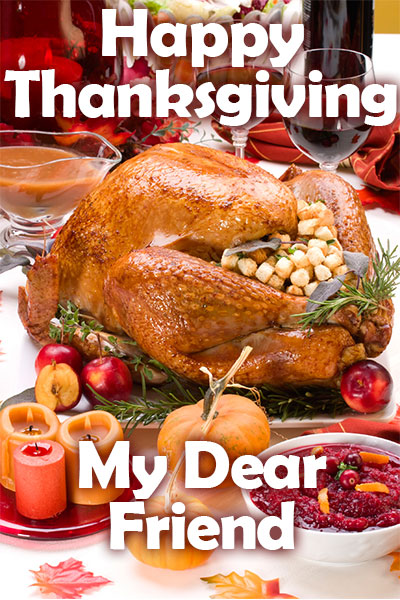 A Thanksgiving table full of food. The focus is a large roasted turkey. 