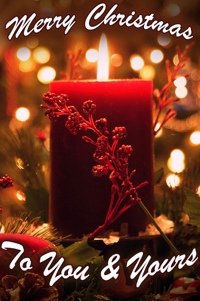 A red candle, surrounded with festive branches. There are softly blurred Christmas lights in the background. The words Merry Christmas to You and Yours are in the foreground.