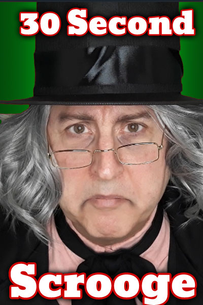 A grumpy looking man with long grey hair, a stovepipe hat, and wire framed glasses sitting crookedly on his nose. 30 Second Scrooge is written in the foreground.