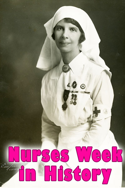 A black and white photo of a nurse in an old fashioned nurse uniform. She has many medals pinned to the front of her uniform.