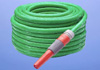 A coiled green garden hose.