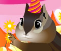 An illustrated chipmunk hangs off of a tree branch to place a candle in a beautifully decorated cake. The ecard title Chester Chipmunk Birthday by Dionne Warwick is written around the chipmunk.