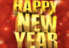 A large, sparkling disco ball is overlaid with the ecard title Dionne Warwick Festive New Year.