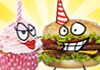 A hamburger, pink cupcake, and pickle, all have cartoon faces, and are wearing cowboy boots. The hamburger and pickle are wearing party hats, while the cupcake has a candle. The pickle is playing the piano. The ecard title Honky Tonk Hamburger 60th Birthday is written above the characters. 