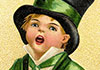 A child stands in a chair in the preview image for this traditional St Patricks Day card. He's wearing a black top hat with a green ribbon, a green suit jacket, and dark pants. He's holding an open book, and there is a wooden club in the chair at his feet.
