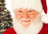 A happy Santa Claus with a Christmas tree in the background. The words Talking Santa are written in the foreground.