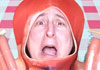 A man dressed as a hot dog in a bun, looking upset, with a worried look on his face.