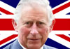 A photo of King Charles with the Union Jack flag behind him.
