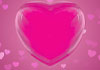 This Valentine's Day ecard shows a hot pink heart in the center against a dark background with small pink hearts in it. The text reads, 